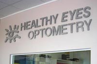 healthy eyes optometry office sign